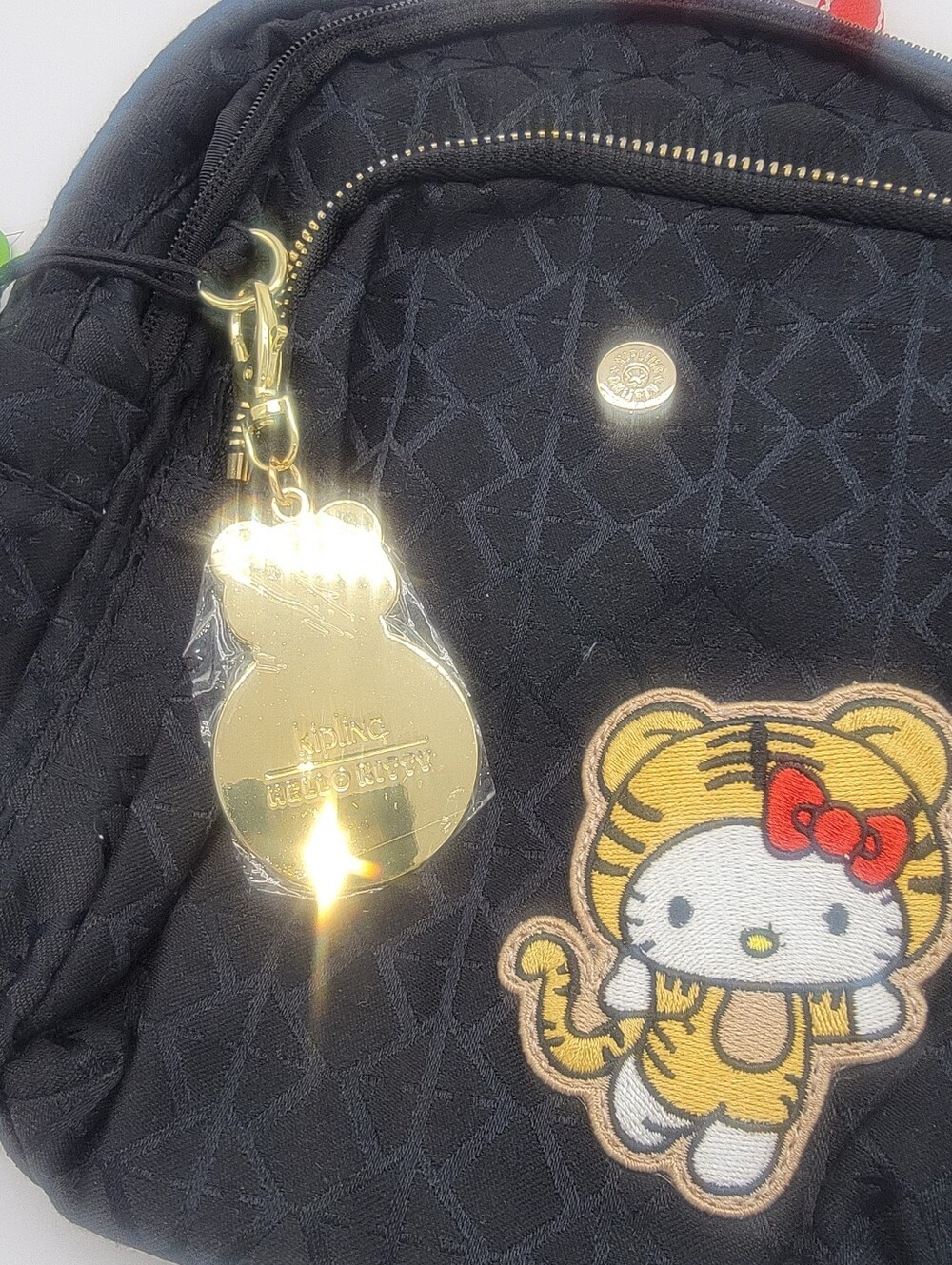 Kipling Black Quilted Mini Backpack with Hello Kitty Tiger Patch and Red Straps - Picture 6 of 6